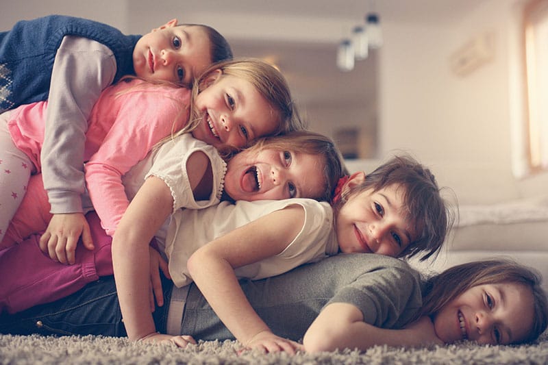 children laying on the floor