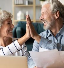 Older couple high five